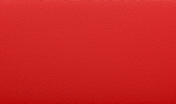Fine texture of natural animal skin. Saturated red color. Expensive finish products
