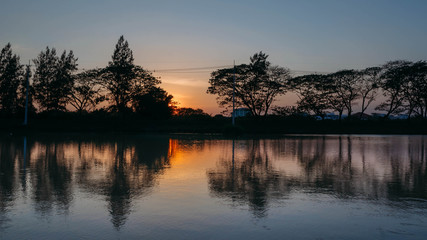 Obraz premium Small lake in the evening summer , Thailand