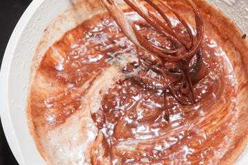 The melted cooled bitter chocolate is mixed with beaten eggs and sugar