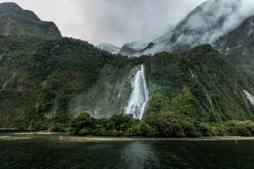 Foto op Canvas Cloudy and rainy day at Milford Sound, South Island, New Zealand © Martin Valigursky
