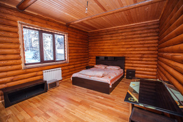 bedroom in a wooden house