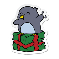 sticker of a cartoon penguin on present