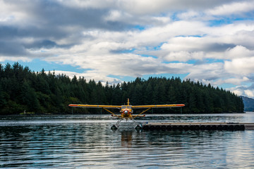 Alaska's transport. Small hydroplane on the water. Ready to start