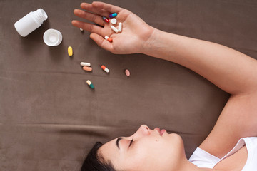 woman taking medicine tablet