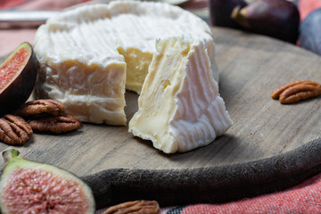 French soft Camembert cheese, original Camembert de Normandie close up