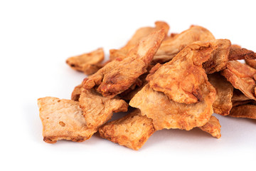 slices of dried papaya on a white background
