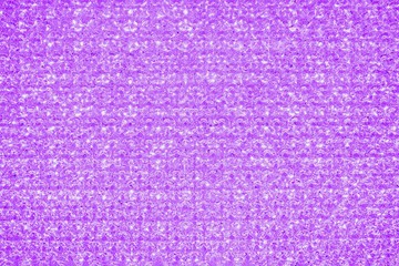 Purple violet crystal glitter texture background. Glittery shiny lights