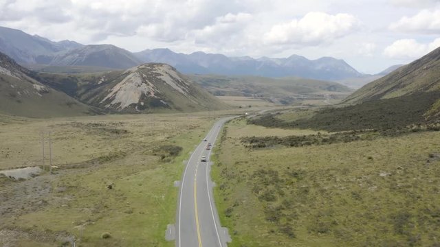 lonely street in the heart of new zealand, aerial drone shot over new zealands streets,