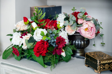 Bouquet of white and red flowers on the table