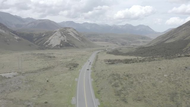 lonely street in the heart of new zealand, aerial drone shot over new zealands streets, Slog Format