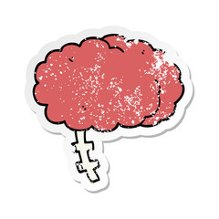 distressed sticker of a cartoon brain