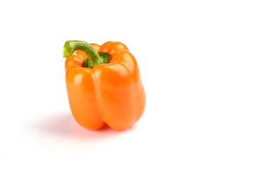 Orange bell pepper isolated on white background