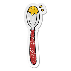 distressed sticker of a cartoon spoon