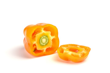 Fototapeta na wymiar Cut of orange bell pepper isolated on white background.