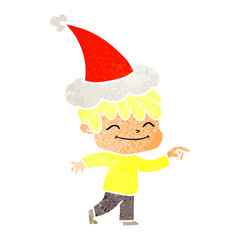retro cartoon of a happy boy wearing santa hat