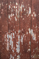 Old Shabby Wooden Planks with cracked red brown color Paint, background