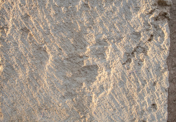 Detail of stone texture for background ocher color
