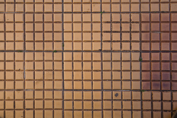 Background of orange clay floor tiles in square shape