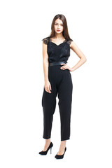 Full body, beautiful brunette woman in a black blouse and pants