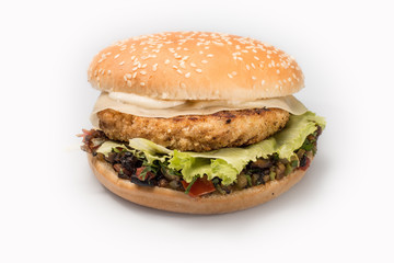 cheeseburger with beef cutlet, bacon, tomatoes and cheese slices, seasoned with sauce and green salad for a restaurant menu on a white isolated background