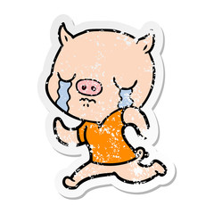 distressed sticker of a cartoon pig crying running away