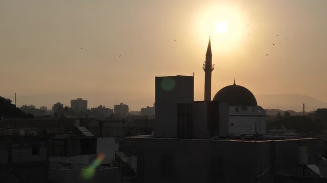 Cityscape of Acre in Israel at sunrise with Al Jazzar mosque