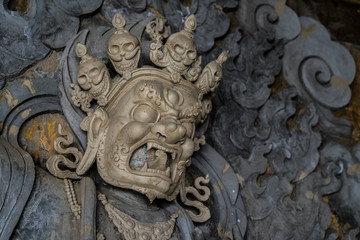 bhutan monastery detail statue painting architecture death demon