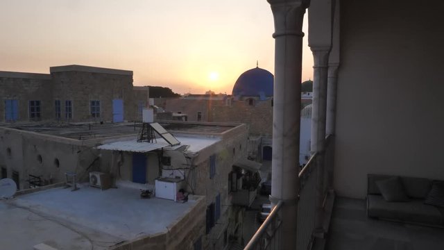 View from balcony at Al Jazzar mosque in Acre, Israel at sunrise. Tilt shot