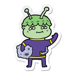 sticker of a friendly cartoon spaceman waving