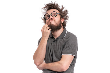 Crazy thoughtful bearded Man with funny Haircut in eye Glasses - ponder and dreaming. Casual thinking guy, isolated on white background. Emotions, and signs concept.