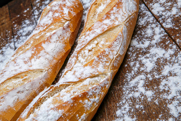 Fresh bread or french baguett and flour