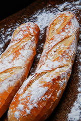 Fresh bread or french baguett and flour