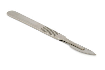 Surgical blade and handle on white background
