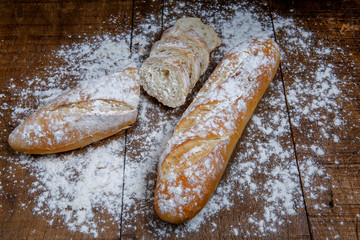 Fresh bread or french baguett and flour