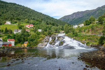 Fototapeta na wymiar waterfall in Hellesylt, Geiranger fjord, Norway
