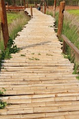 Fototapeta premium Bridge over a cannal in countryside , Thailand