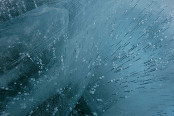 Transparent drops frozen in the ice of Bakal, suitable for the background or wallpaper of your design
