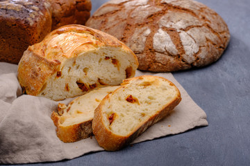 Assortment of freshly baked loaf of bread. Home bakery. Homebaked bread