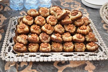 cookies.Moroccan biscuits are served with tea. Moroccan biscuits are offered at the wedding and Eid al-Fitr