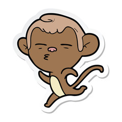sticker of a cartoon suspicious monkey