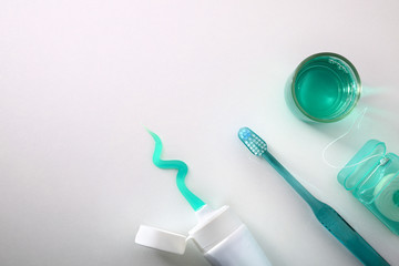 Equipment for oral cleaning on a white table top view