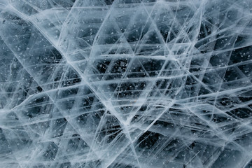 Grid of white cracks of ice of Baikal, suitable for a background or wallpaper of your design.