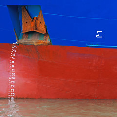 Waterline numerals and markings on the hull of a cargo vessel