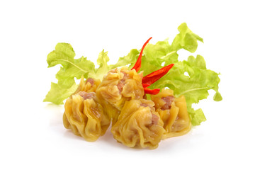 Stream pork and shrimp dumplings on white back ground.