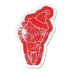 laughing cartoon distressed sticker of a man wearing santa hat