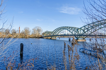 Arch bridge Eiswerderbruecke over the river Havel in Berlin, Germany
