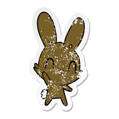 distressed sticker of a cute cartoon rabbit