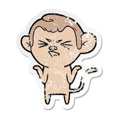 distressed sticker of a cartoon annoyed monkey