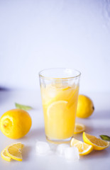 Lemonade. Drink with fresh lemons. Lemon cocktail with juice and ice.