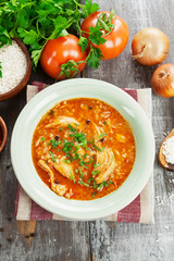 Traditional georgian soup kharcho in a plate on the table